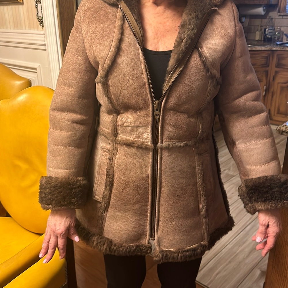 Vintage women’s genuine shearling hooded zippered jacket.